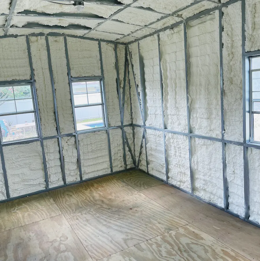 Closed-cell spray foam insulation applied to wall cavities in a residential project in Winona